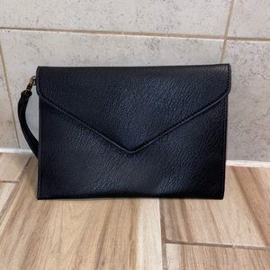 Black leather wristlet.